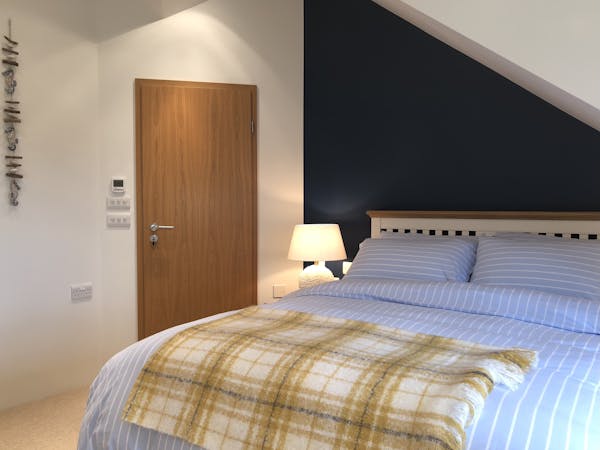 Luxury Double - Bed and main door