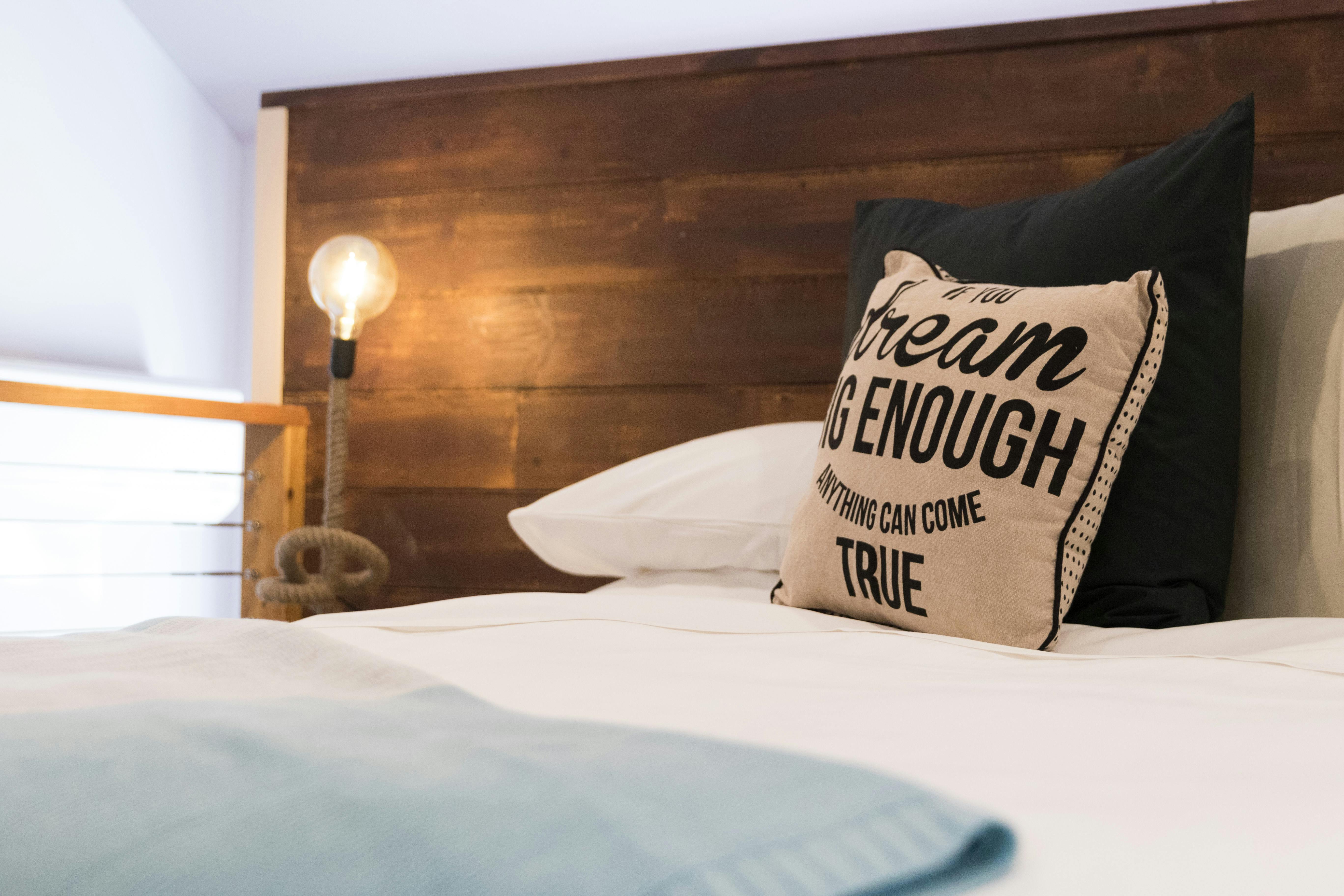 Cushions on bed in king gallery