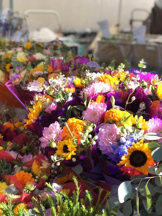 Yellow, pink, purple and blue floral arrangements