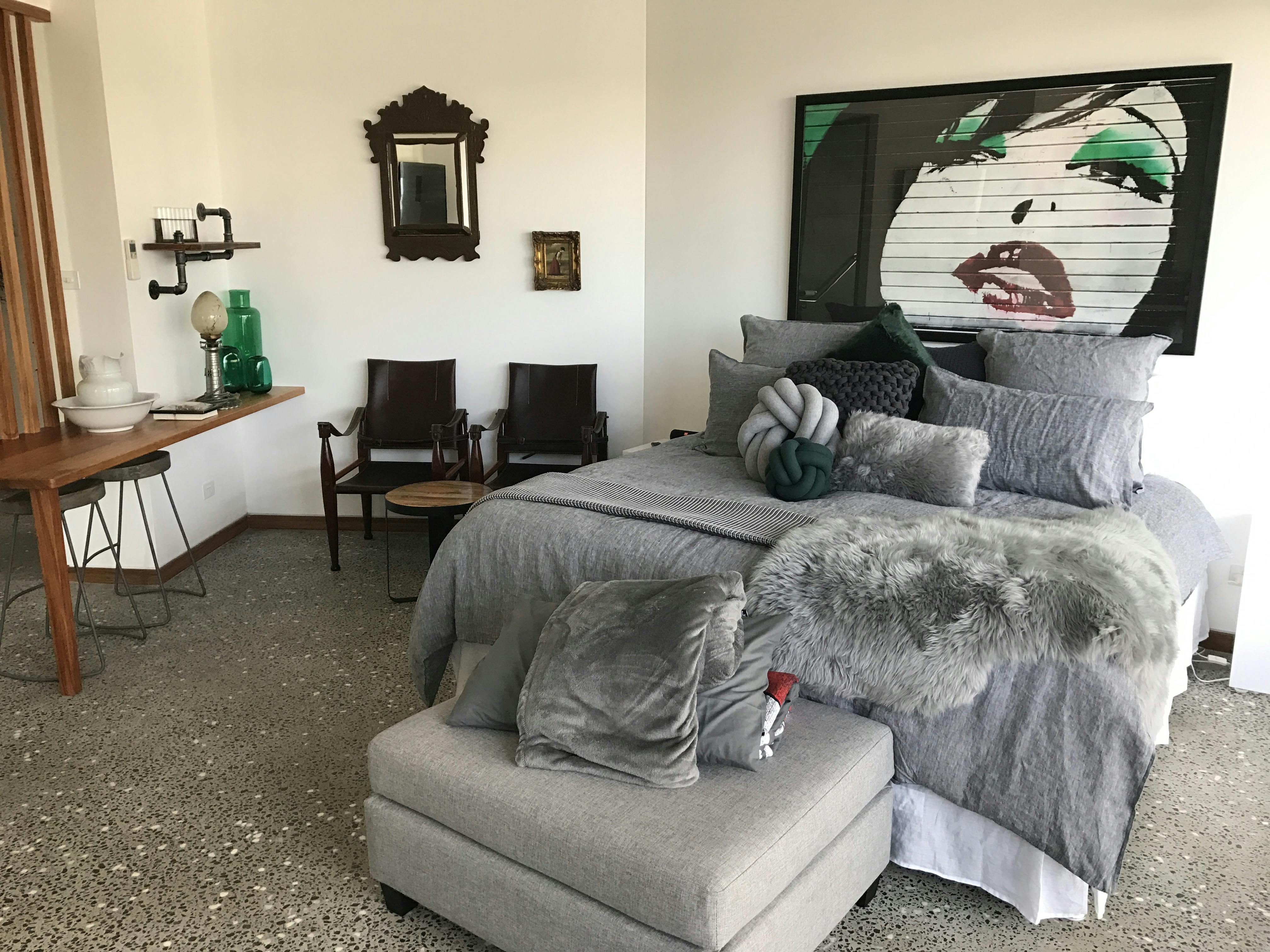 Lake View Suite.Luxury King bed and premium linen tastefully styled for your comfort and enjoyment.