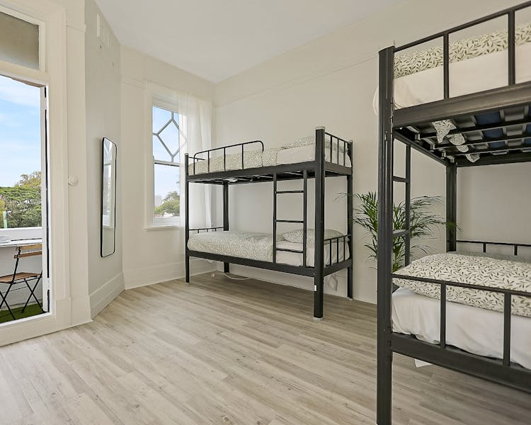 Spacious 4 Bed Deluxe Dorm with balcony view and full length mirror