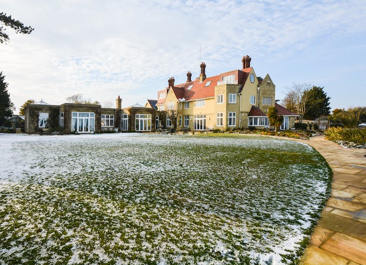 Haven Hall Hotel snowy upper lawn & House
