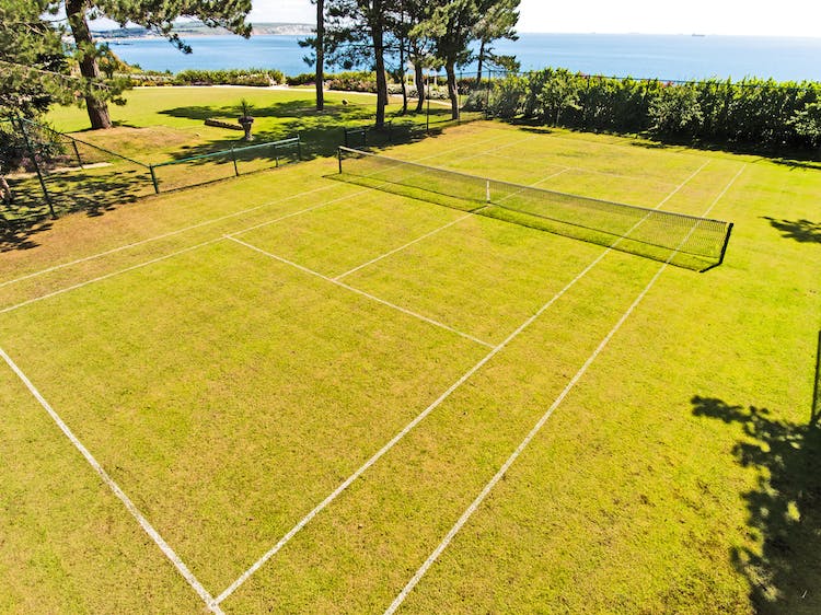 Haven Hall Hotel grass tennis court by the sea