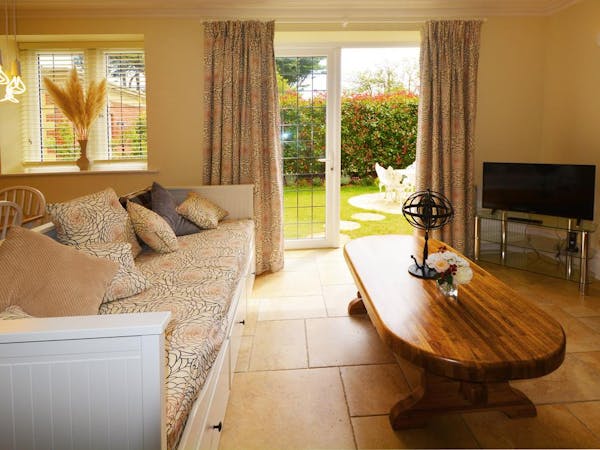 Haven Hall Hotel. Gardenia Suite with view of private patio and garden