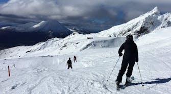 People skiing on Whakapapa ski field on Mt Ruapehu