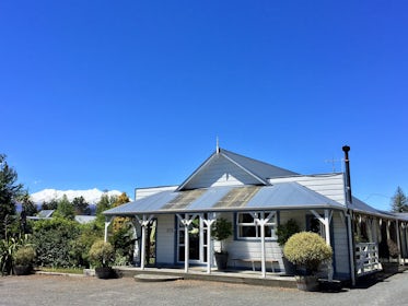 Tongariro Crossing Lodge front entrance with view of Mt Ruapehu in the background 1