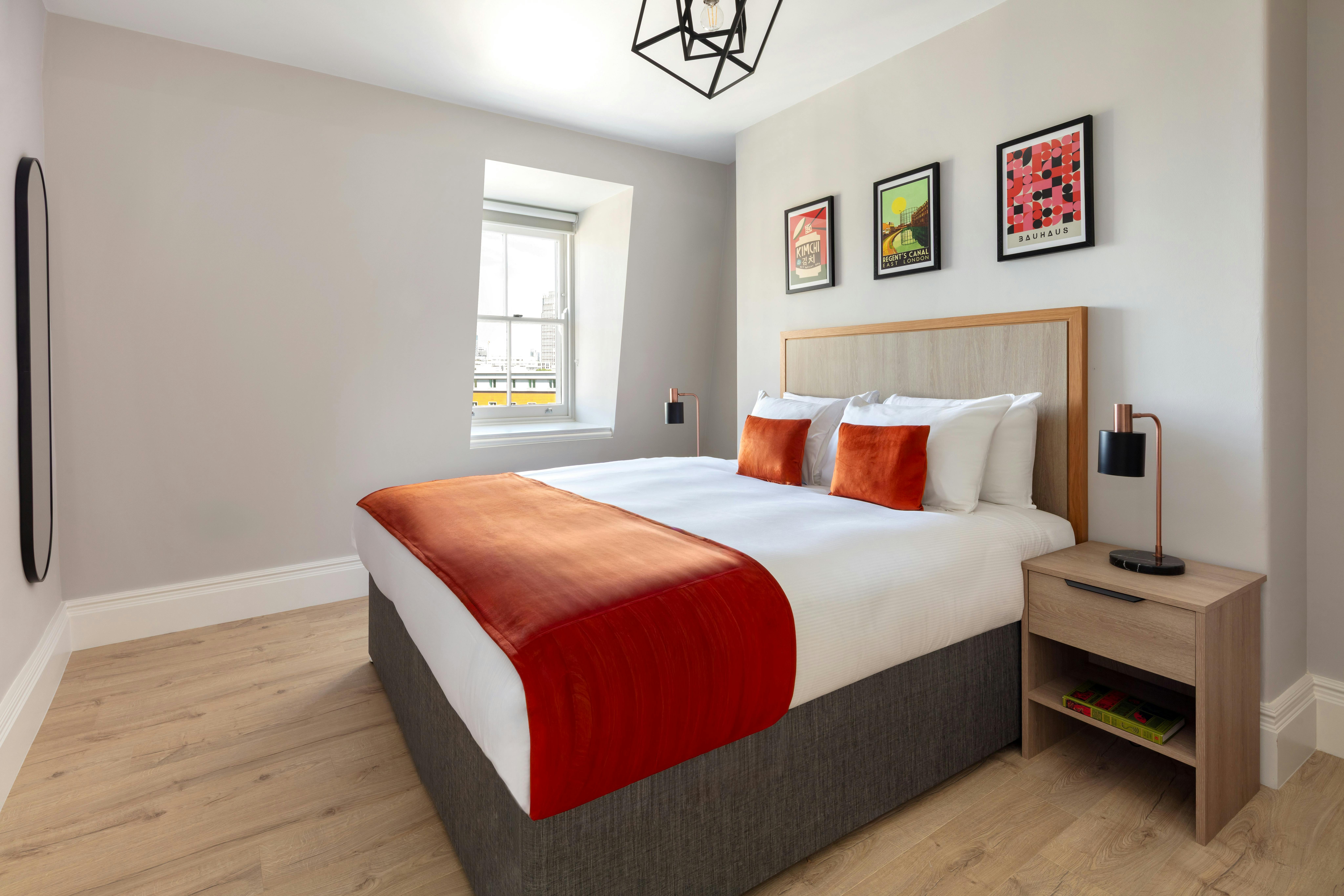 modern bedroom with large double bed