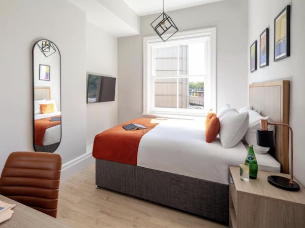 modern bedroom with large double bed