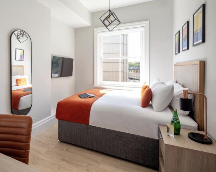 modern bedroom with large double bed