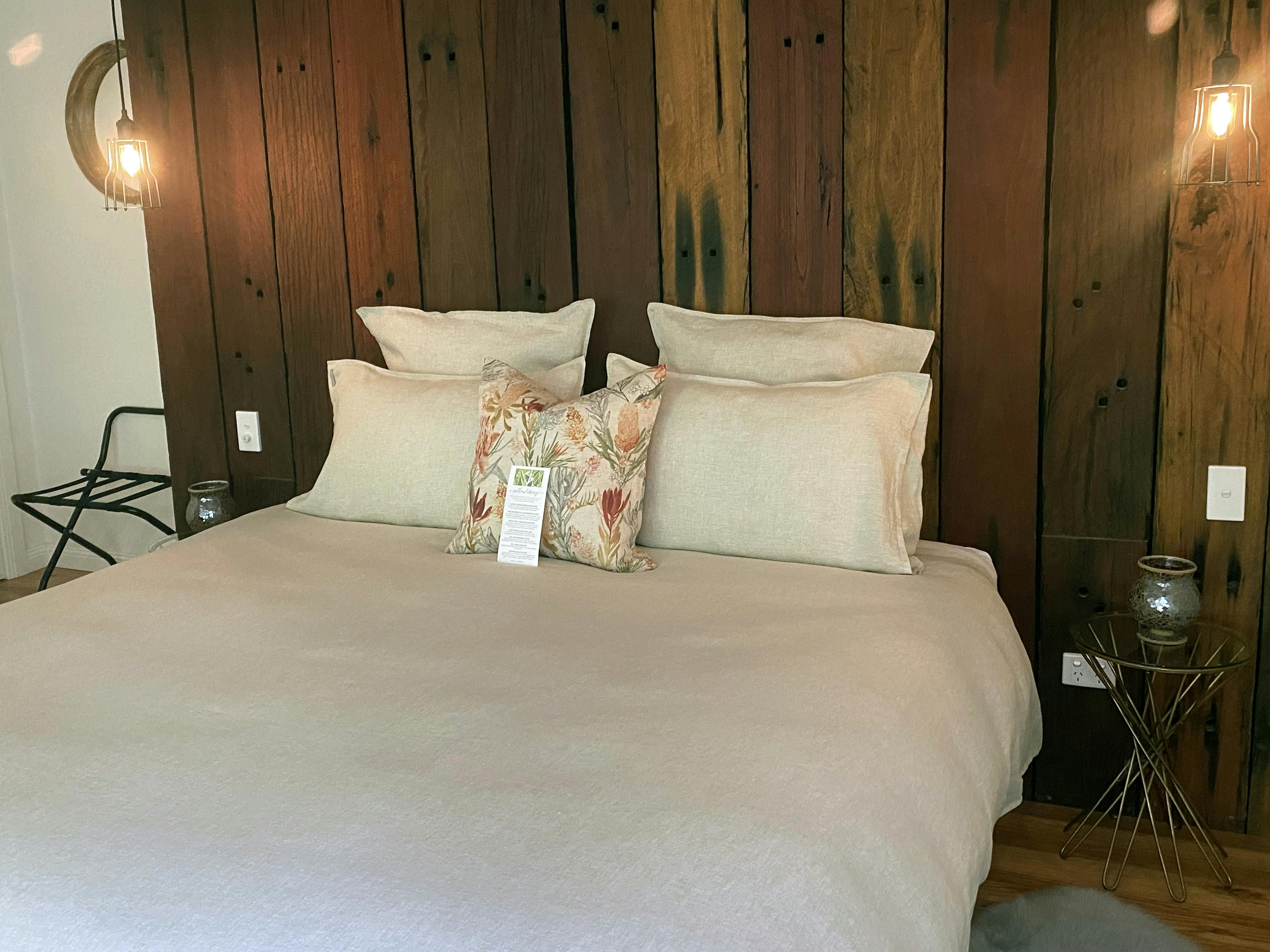 King Size Bed with Feather down quilt and designer linens