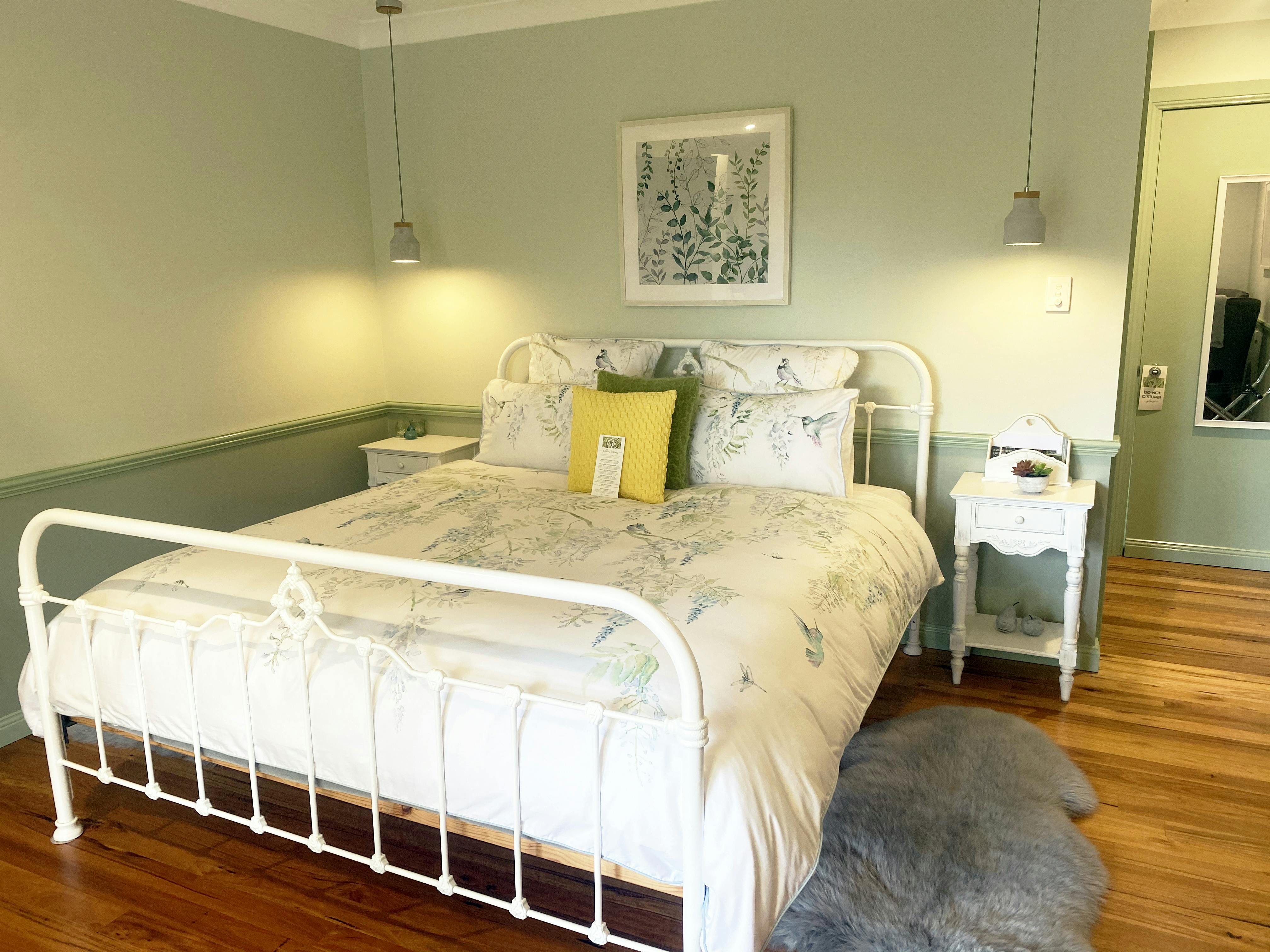 King Size Bed with Feather down quilt and designer linens