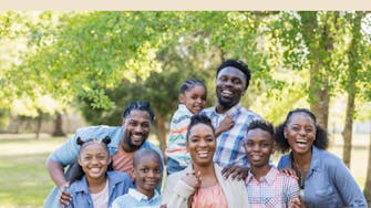 A large group of people that seem to be a family.