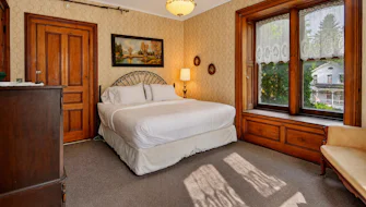 Room 1: King Bed w/ Private En Suite Bath