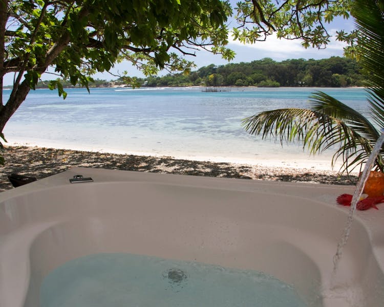 Beachfront Deluxe Spa Villa - 2 person Spa on the deck where you can relax and enjoy the amazing views erakor island