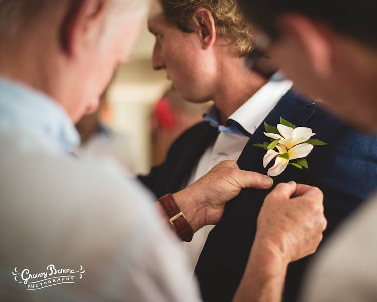 Grooms buttonhole erakor wedding flowers #erakorbeachweddings #weddingceremonyonthebeachsouthpacific #vanuatuislandweddings