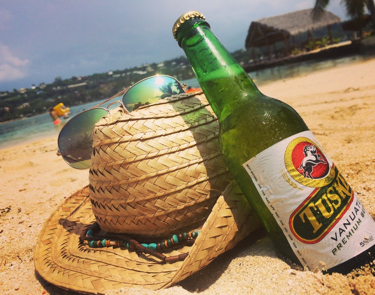 Tusker on the beach of Erakor Island #erakorislandndresort #tropicalislandholiday #Vanuatuaccommodation