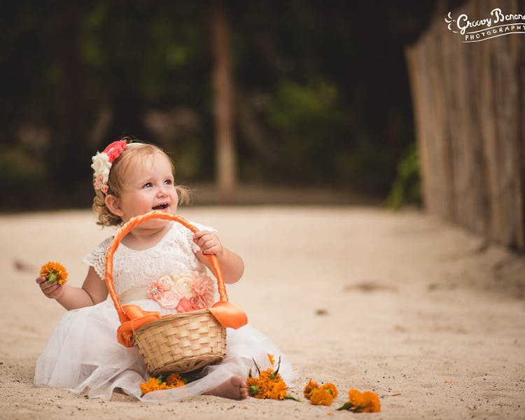 Flowergirl with petal basket on Calypso Beach#erakorbeachweddings#weddingceremonyonthebeach #erakorbridalbouquet
