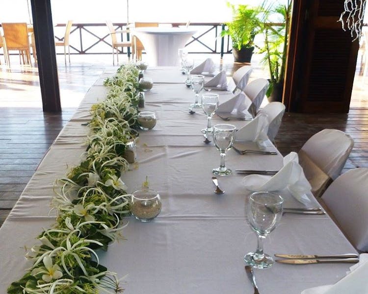 Aqua on Erakor Overwater Restaurant Bridal Table Floral Decor #erakorbeachweddings #weddingreceptionthebeachsouthpacific #Van