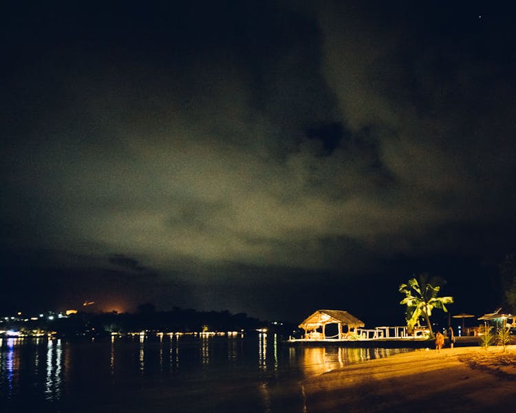 Erakor Island Calypso Beach view by night #erakorbeachweddings #weddingreceptionthebeachsouthpacific