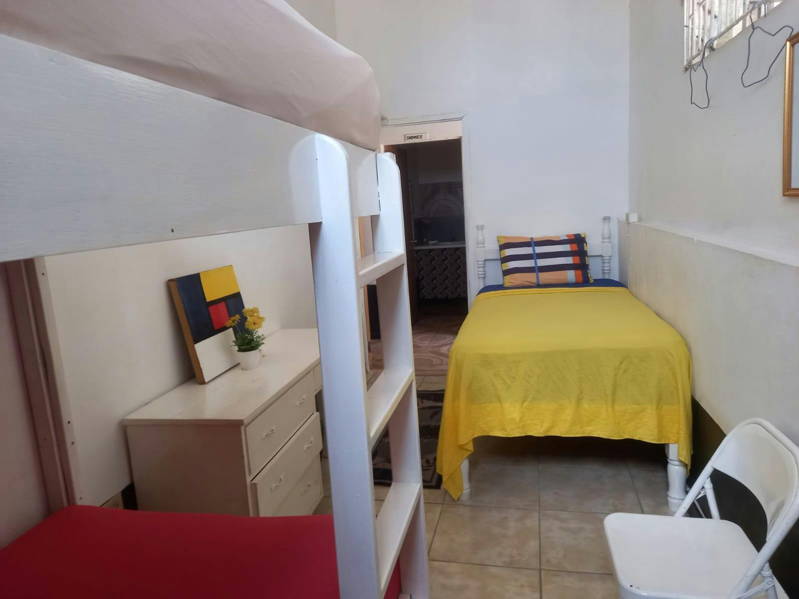 Room 1 Triple Room with shared bathroom.