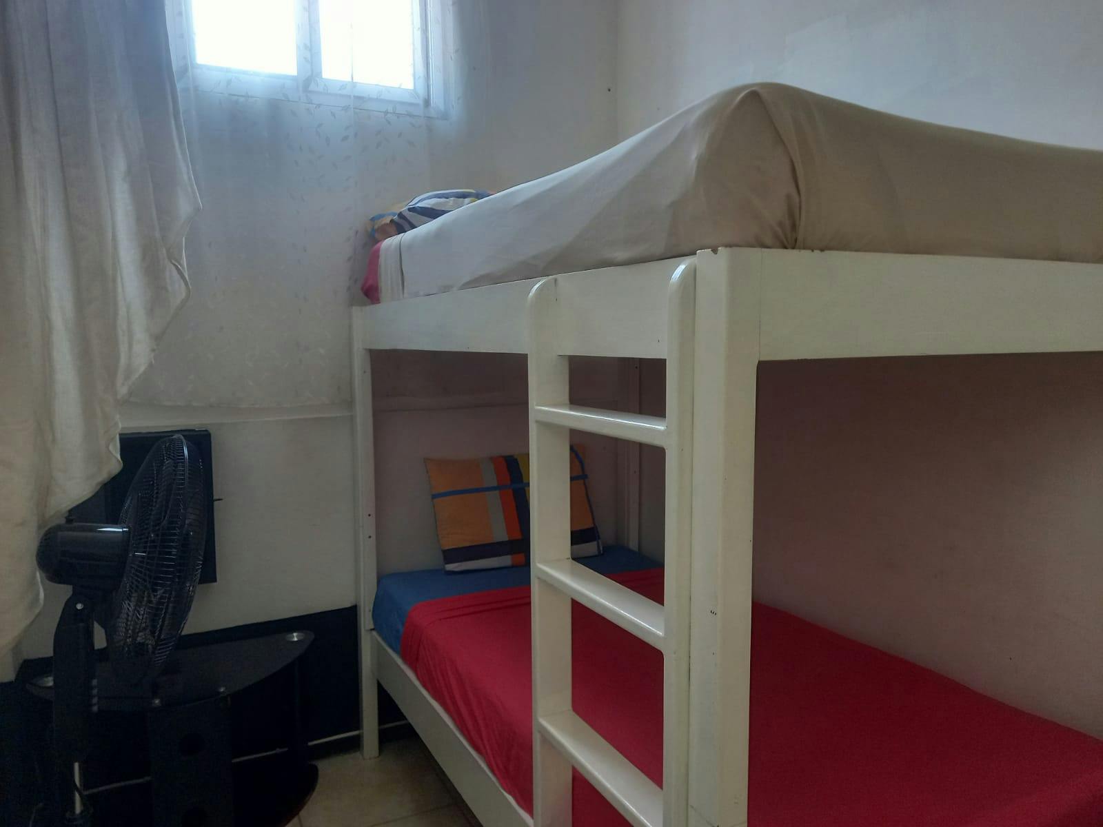 Room 1 Triple Room with shared bathroom.