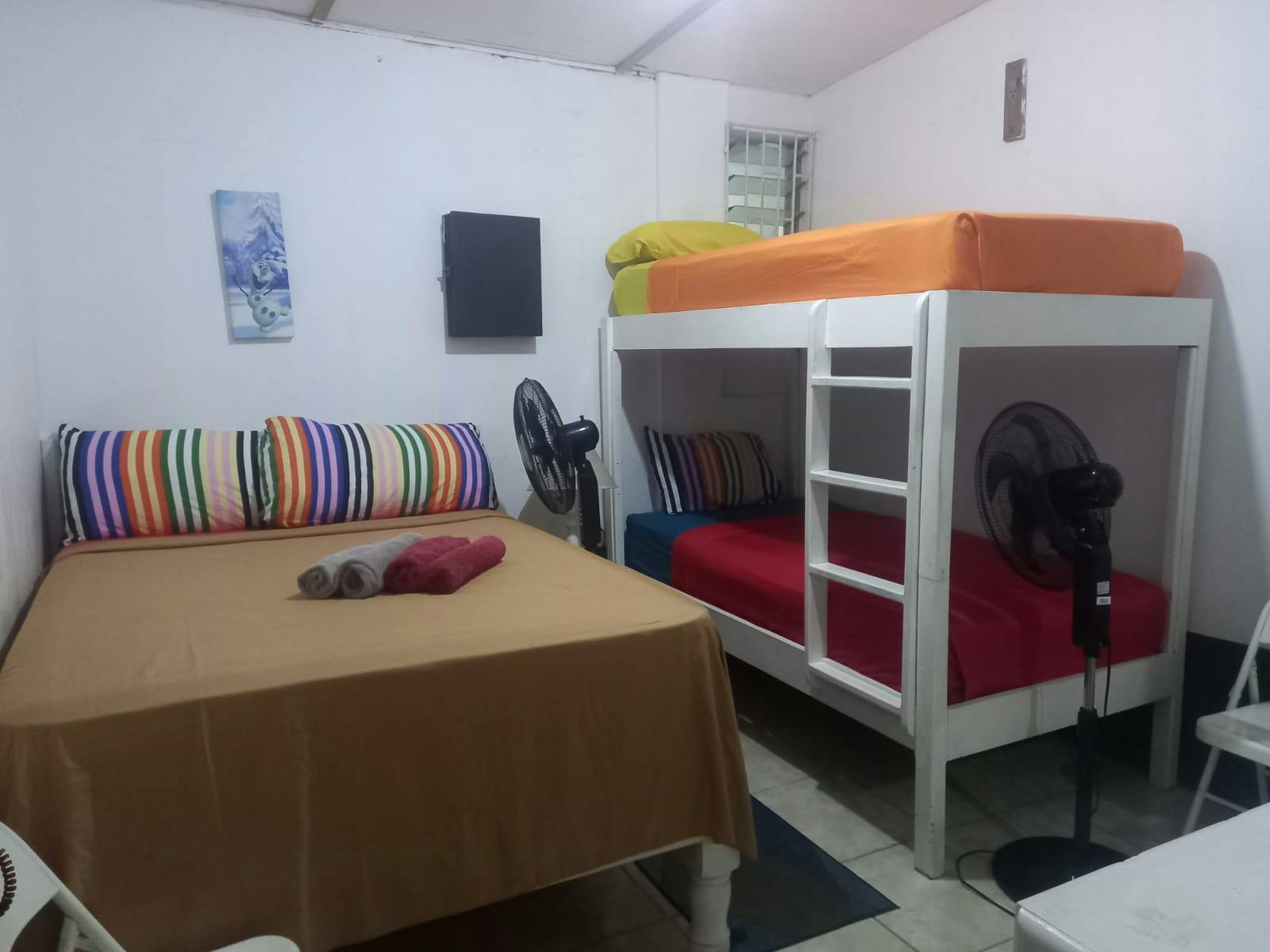 Room 4 Quadruple family Room with shared bathroom.