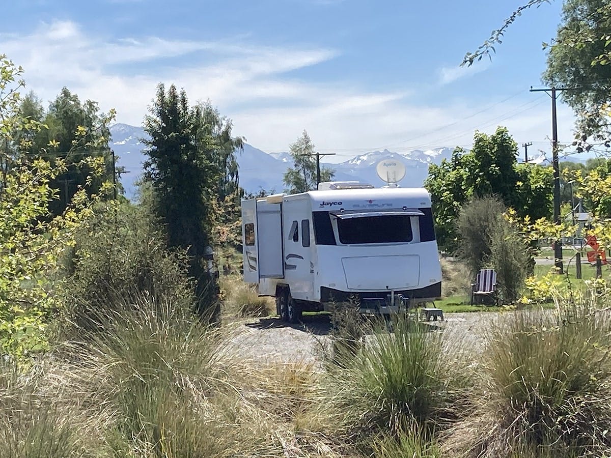 Campervan parking with native shrubs at Musterer's Accommodation, Fairlie.