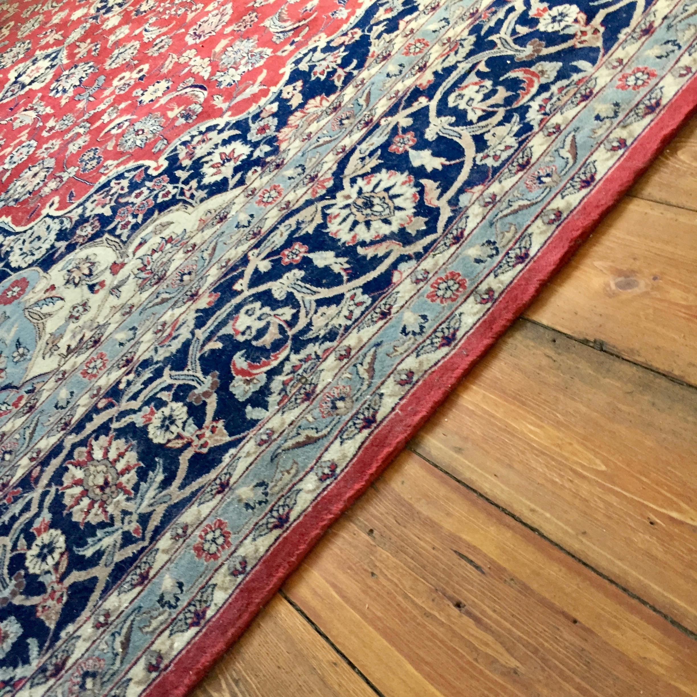 The luxe fine silk Chinese carpet on our original hardwood floors in the Purple Room.