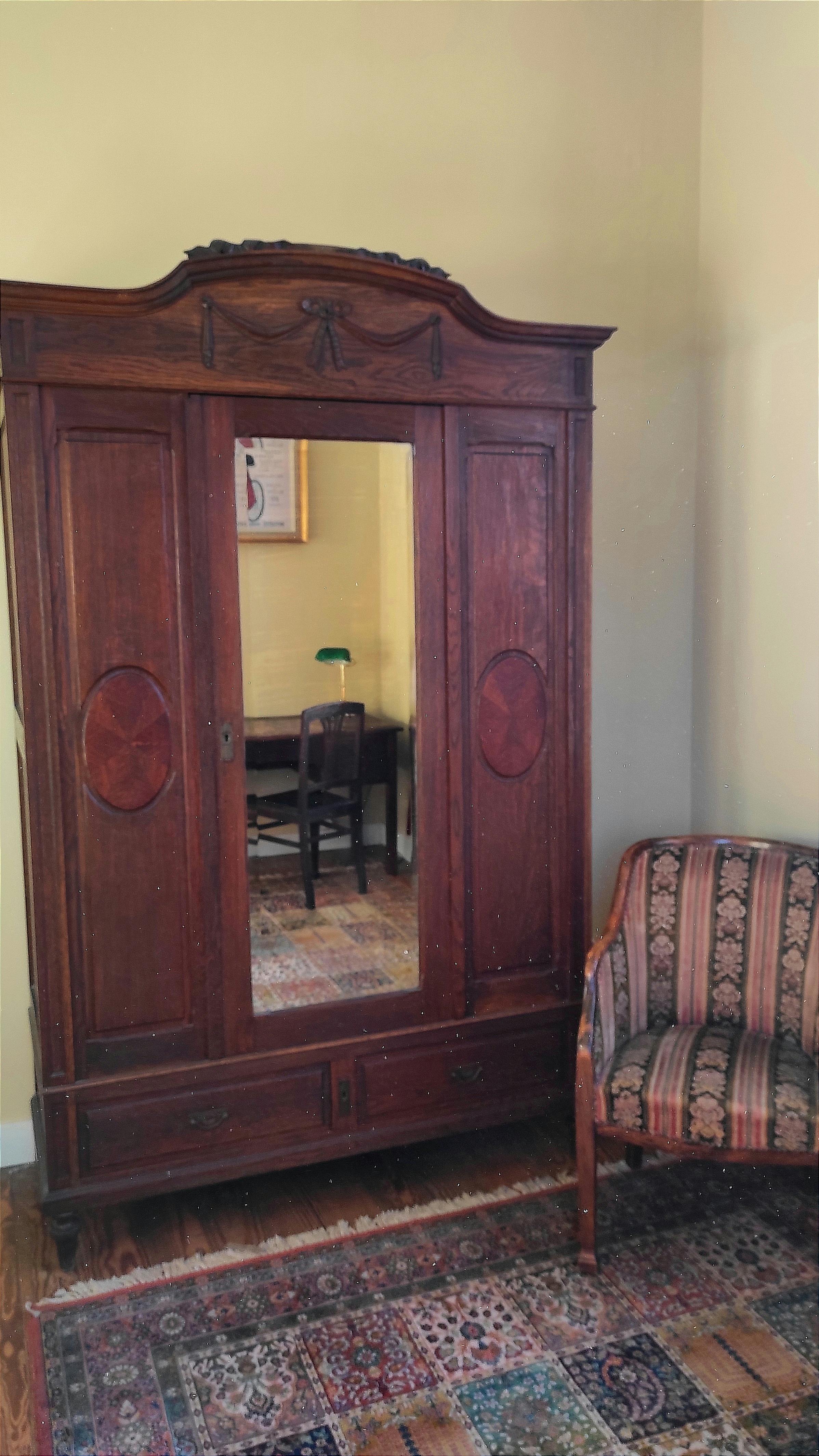 Large closet in a charming, authentic room for cyclists at La Maison Vienvenue.