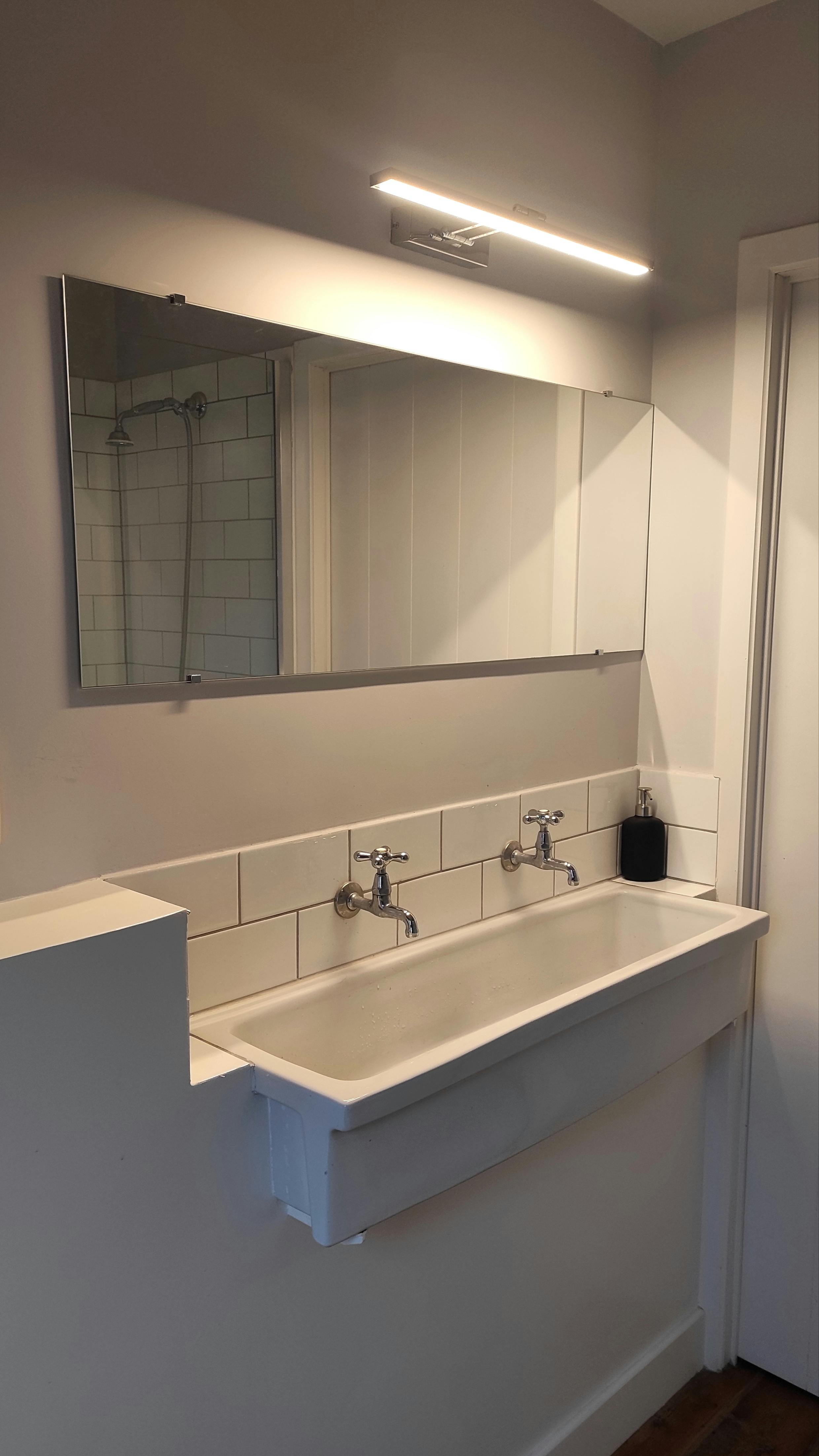 Another shared shower bathroom at La Maison Vienvenue, clean, nice, and authentic.