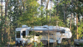 alt="Customers enjoying the full hookup RV Park at Best Bear Lodge & Campground in Irons Michigan"