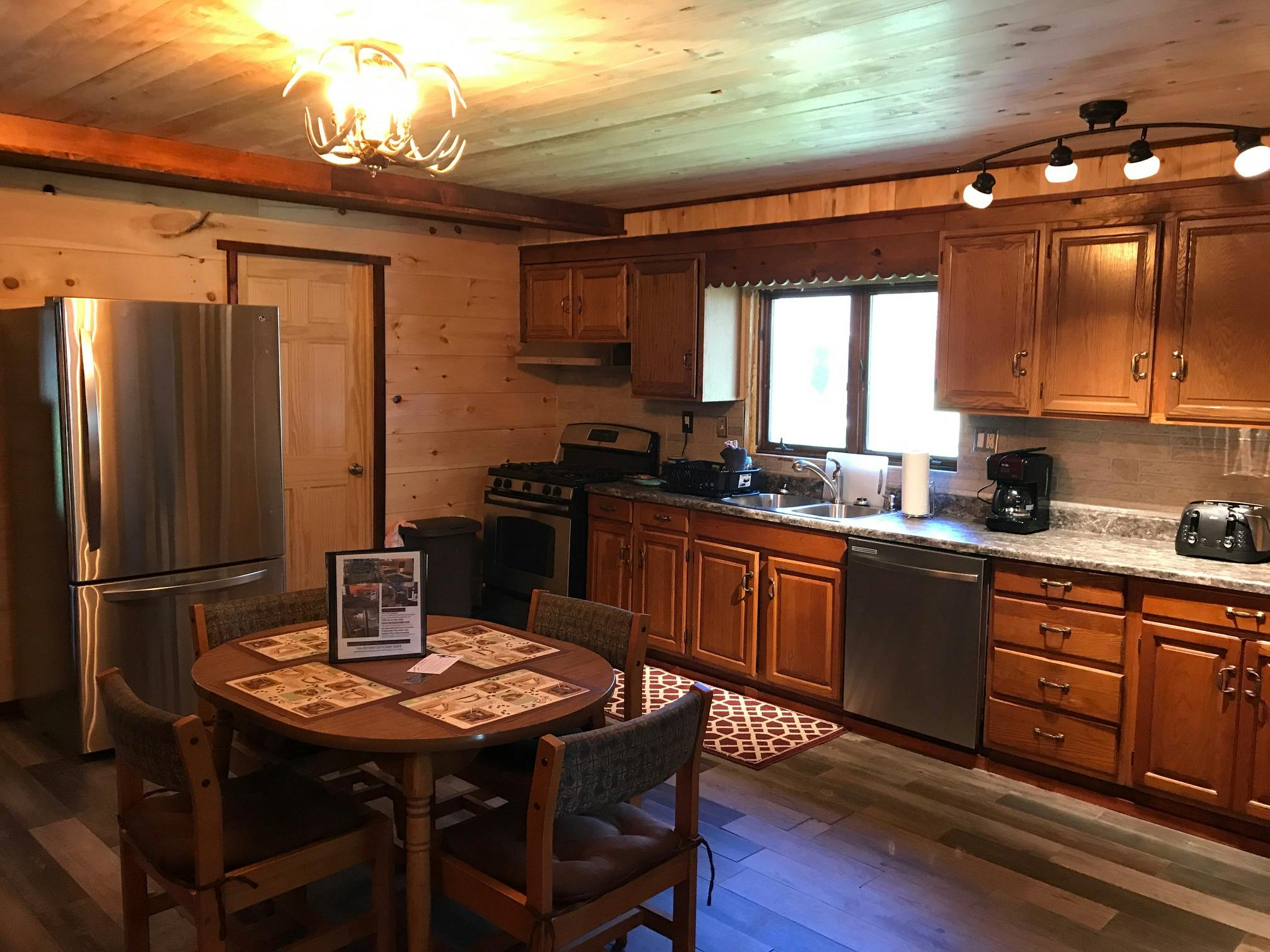 The Grand Daddy Cabin Sleeps Eight, Full Kitchen, Stainless Steel Appliances at Best Bear Lodge & Campground