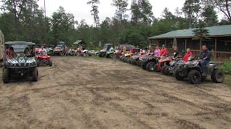 alt="People love to stay and ride ATVs at Best Bear Lodge & Campground in Irons Michigan"