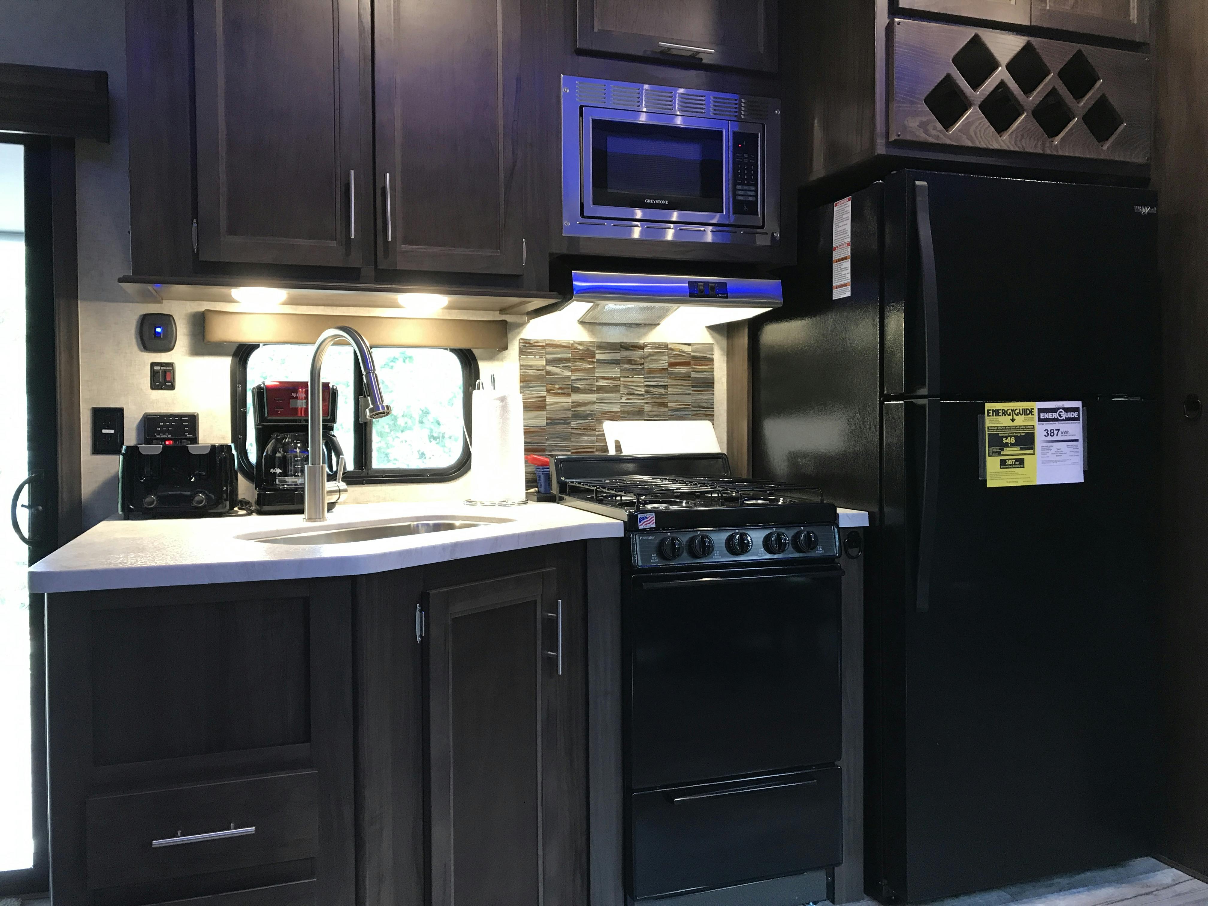 Grand Cherokee Destination RV Cabin Rental, Full Size Fridge at Best Bear Lodge & Campground