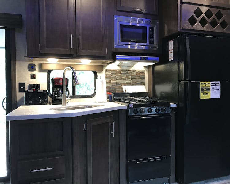 Grand Cherokee Destination RV Cabin Rental, Full Size Fridge at Best Bear Lodge & Campground