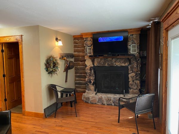 Lincoln Hills Cabin Living Room at Best Bear Lodge & Campground. Irons, Michigan