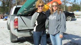 alt="Best Bear Lodge guest enjoying the Pine River in Irons Michigan"