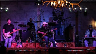 alt="Ray Scott and The Trophy Husbands Band live performance at Rhinestone Event Center Best Bear Lodge in Irons Michigan"
