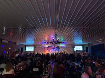 alt="Onager Band performing live in the Rhinestone Event Center at Best Bear Lodge & Campground. Irons, Michigan"