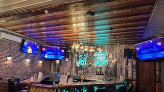 alt="The Rhinestone barroom at Best Bear Lodge & Campground in Irons Michigan"