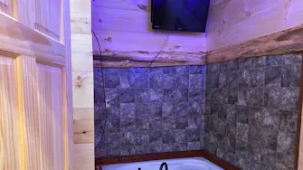 Speedy Bear Cabin with two person jetted tub at Best Bear Resort in Irons Michigan