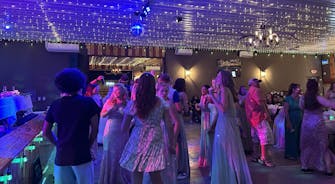 alt="Wedding at Best Bear Lodge Rhinestone Event Center in Irons Michigan