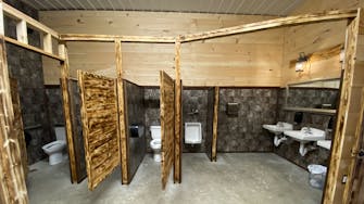 alt="Elegant handicap accessible men's bathroom in the Rhinestone Event Center at Best Bear Lodge & Campground in Irons MI"