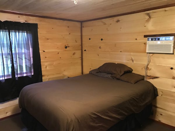 The Grand Daddy Cabin Sleeps Eight, with Two King Bedrooms at Best Bear Lodge & Campground