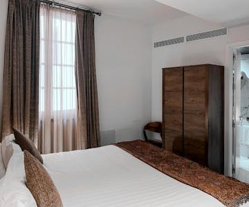 Cozy room with minimalist decor and wardrobe