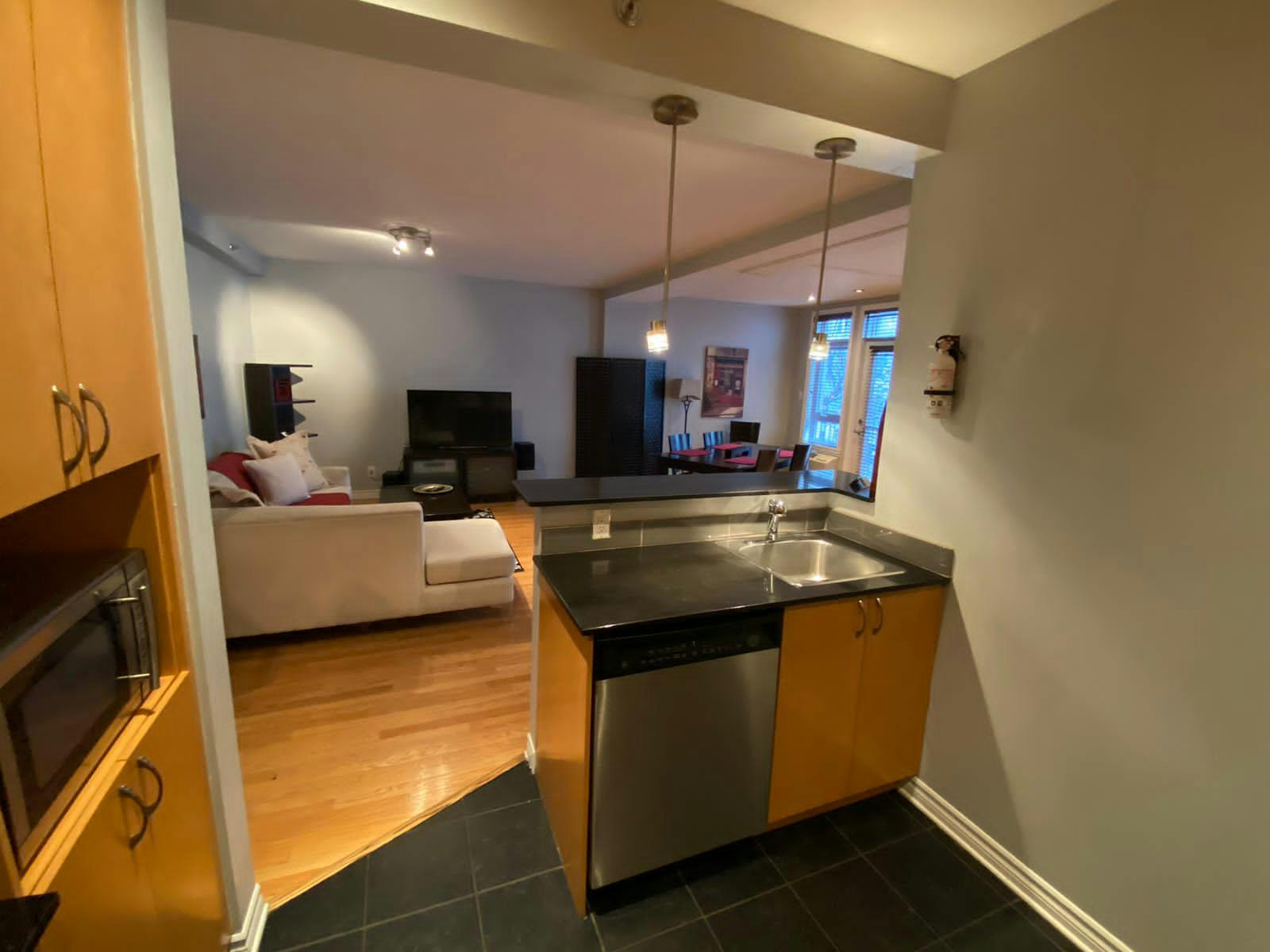 Corporate Suite 301 ApartHotelMontreal AppartHôtelMontréal CITQ 222512 2115 Rue Saint Urbain H2X 2N1 #aparthotelmontreal