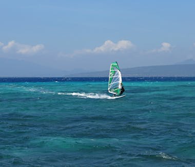 Bangsring Breeze windsurfing at Tabuhan Island