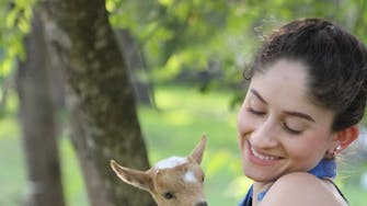 Animal-assisted therapy goats with guests in Alvin, Texas