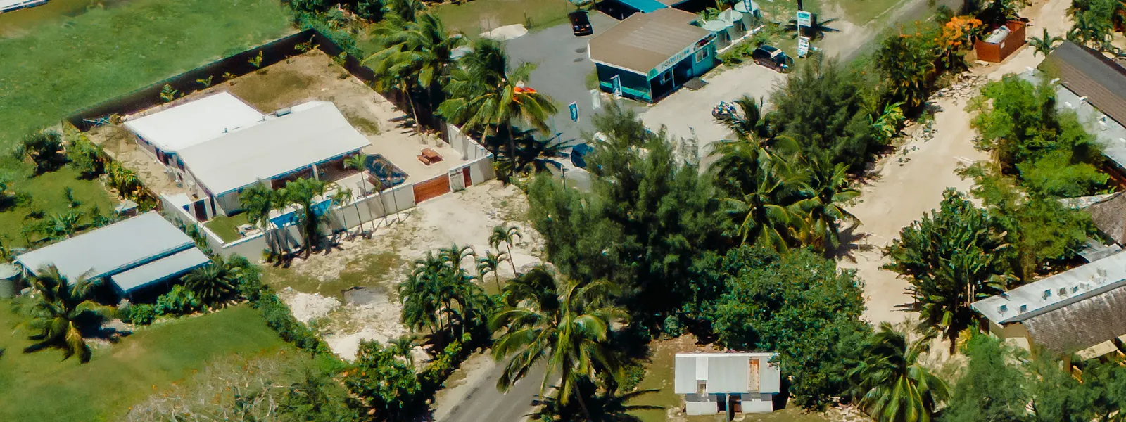 Birdseye view showing the property and the beach across the road from the Villa.
