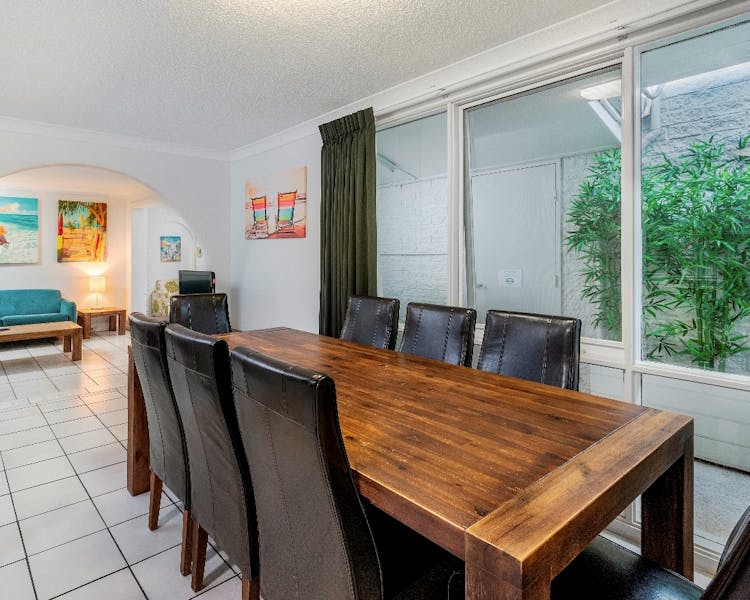 Large dining area in the apartment, suitable for groups or long stays in Hervey Bay